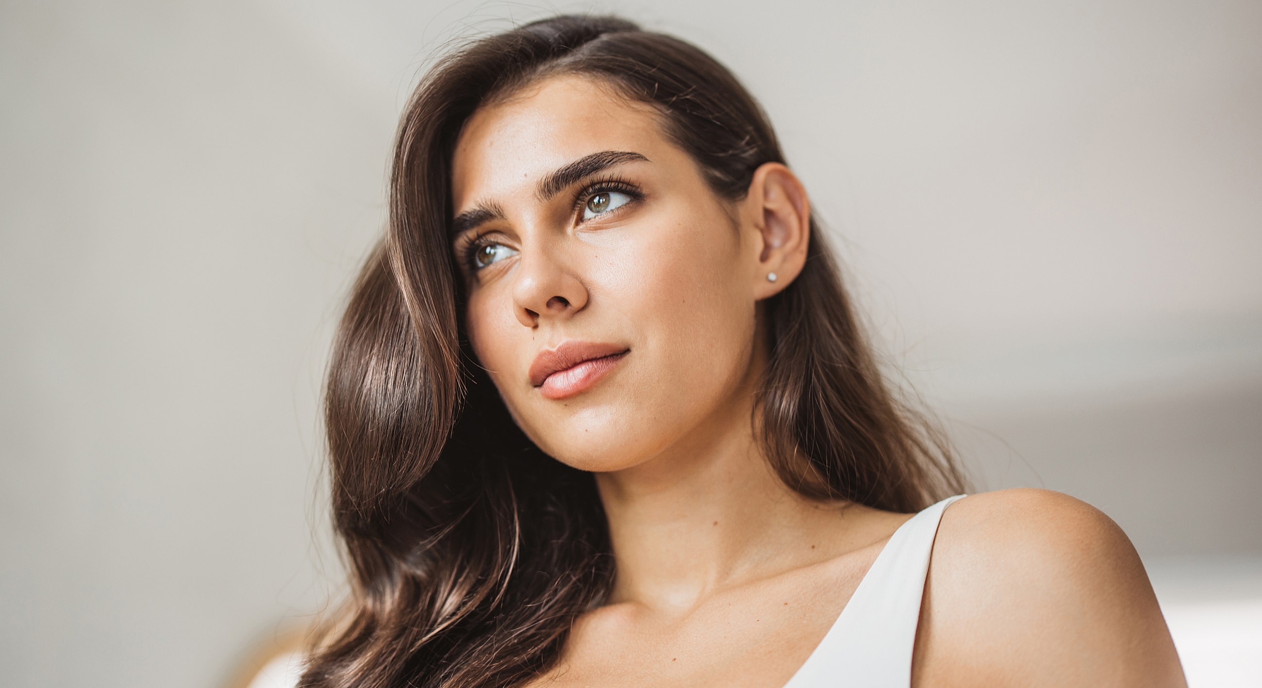 Portrait of a Melbourne otoplasty model with long hair.
